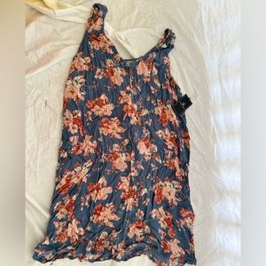 Women’s summer button down dress - tag says large but is very small.